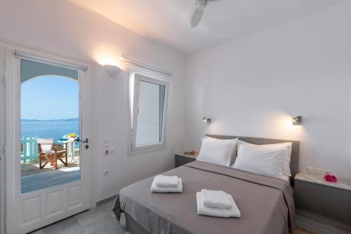 Ένα ή περισσότερα κρεβάτια σε δωμάτιο στο Aegean Dream Apartments 