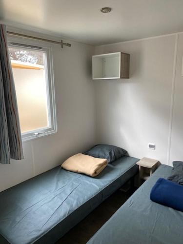 Ένα ή περισσότερα κρεβάτια σε δωμάτιο στο Le Solèou