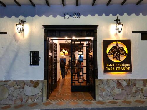 a door to a casa grande entrance to a building at Hotel Boutique Casa Grande in Piedecuesta