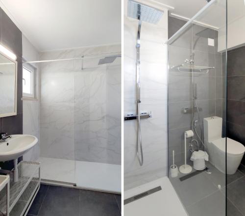un bagno con doccia, WC e lavandino di Carcavelos Beach Apartment a Cascais