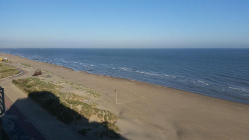 an aerial view of a beach next to the ocean at Studio On The Beach With Sea View in Middelkerke