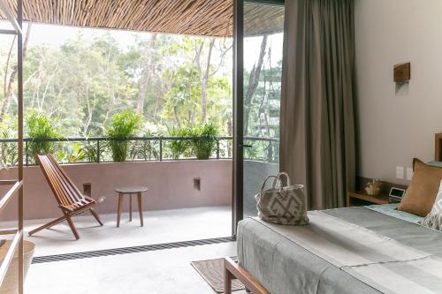 Uma varanda ou terraço em Zereno Tulum Beach Club Access