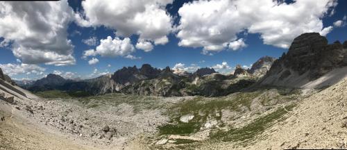 a view of a mountain range with clouds in the sky at Gasthof Sprenger in Sillian