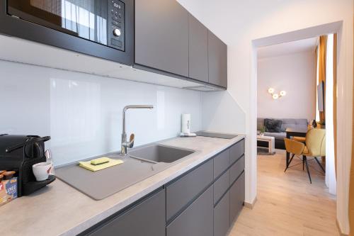 Kjøkken eller kjøkkenkrok på WF-Apartment zentral, trendig & modern, Westbahnhof