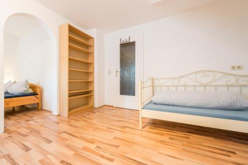 Postel nebo postele na pokoji v ubytování Ferienwohnung Fischach