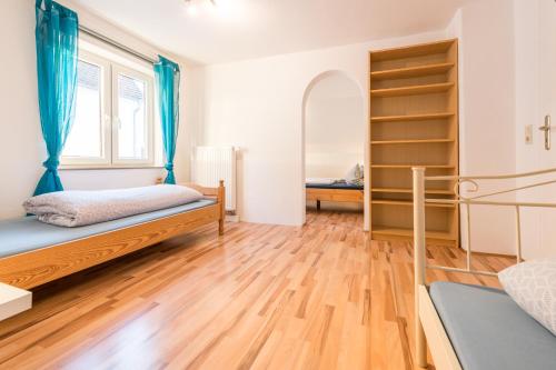 Postel nebo postele na pokoji v ubytování Ferienwohnung Fischach