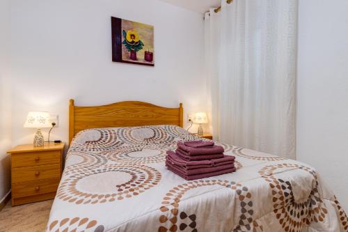 Postel nebo postele na pokoji v ubytování Caballero Apartment