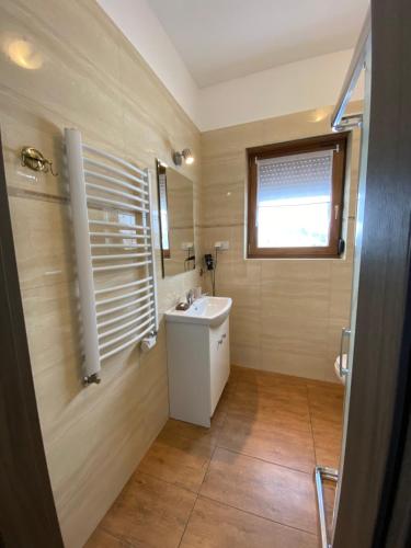 Kúpeľňa v ubytovaní Dom Nad Brennica