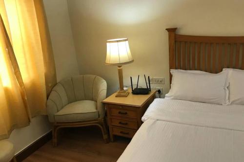 Llit o llits en una habitació de 1BHK Luxury Homestay In Betalbatim South Goa 1km from the Beach
