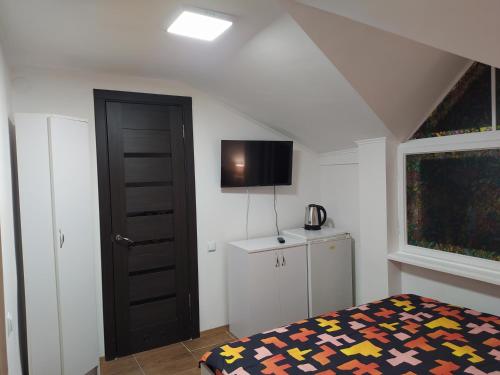 Кровать или кровати в номере Lemberg Relax House