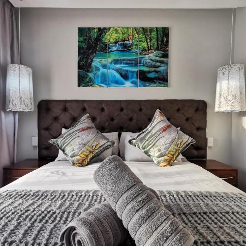 Ένα ή περισσότερα κρεβάτια σε δωμάτιο στο St Lucia Hilltop Guest House
