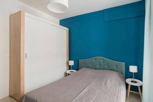 En eller flere senge i et værelse på Blue Apart - Modera Residence, Sofia