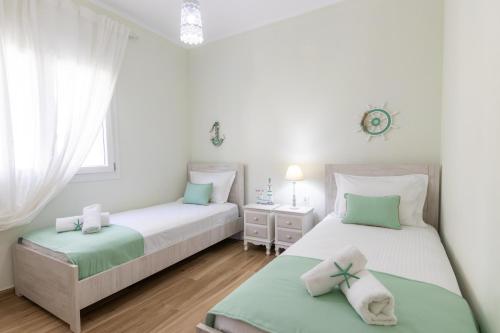 Posteľ alebo postele v izbe v ubytovaní Hestia Harmony Living