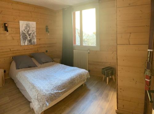 Postel nebo postele na pokoji v ubytování LA PERLE DES CAILLOUX EXCEPTIONNEL et COSY