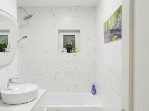 Ένα μπάνιο στο Zen Life Luxury Apartment - Herastrau