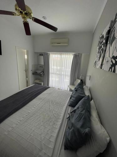 Ένα ή περισσότερα κρεβάτια σε δωμάτιο στο Hotel Valeria Apart & Hotel Spa