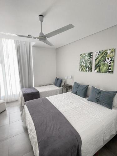 Ένα ή περισσότερα κρεβάτια σε δωμάτιο στο Hotel Valeria Apart & Hotel Spa