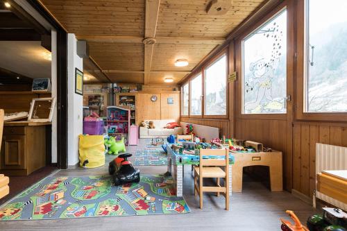 a small room with a table and a room with a tableablish at Appartement Haus Zalim in Brand