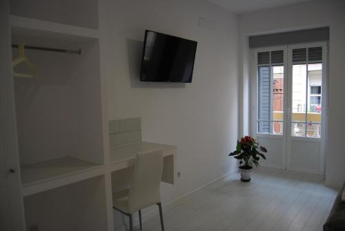 Μια τηλεόραση ή/και κέντρο ψυχαγωγίας στο Hostal Madrid Star