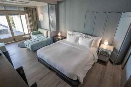 Ένα ή περισσότερα κρεβάτια σε δωμάτιο στο B House Samui