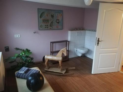 Кровать или кровати в номере Ferienwohnung Am Schloßberg