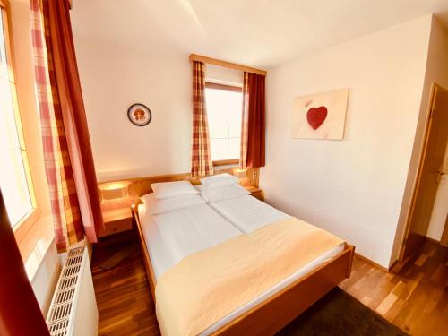 Cama o camas de una habitación en Gasthof zum Moosmann - Familie Pachernigg