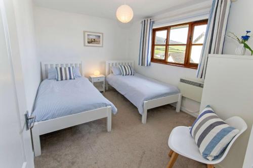 Postel nebo postele na pokoji v ubytování Rockpool - Attractive and spacious retreat near Croyde beach - Sleeps 8