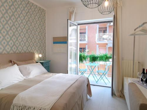 En eller flere senge i et værelse på Nodo Margherita