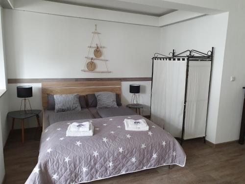 Postel nebo postele na pokoji v ubytování Ferienwohnungen Naturzeit
