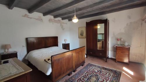 A bed or beds in a room at La Casetta di Musita