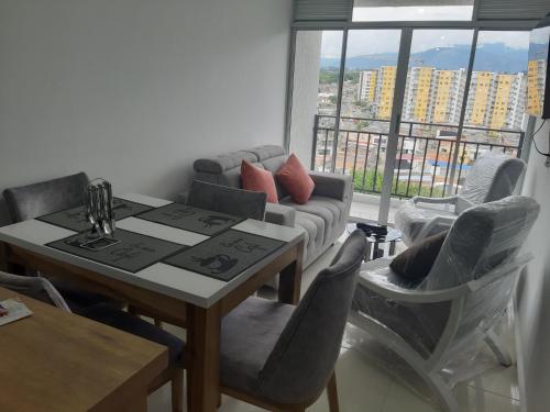 Χώρος καθιστικού στο Aparta-Hotel Cafetero Oviedo