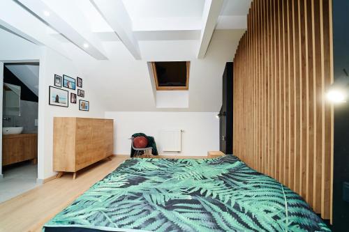 Ένα ή περισσότερα κρεβάτια σε δωμάτιο στο LOFT Apartment