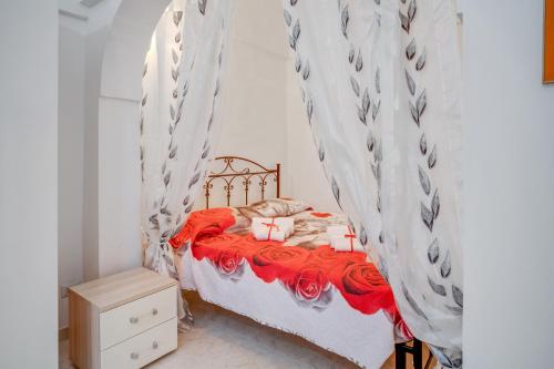 Postel nebo postele na pokoji v ubytování IL NIDO Cozy Flat in Ostuni