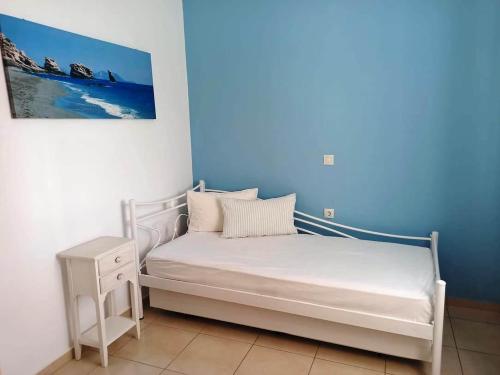 Ένα ή περισσότερα κρεβάτια σε δωμάτιο στο Villa George Sea View with pool - Triopetra