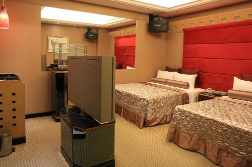 Ein Bett oder Betten in einem Zimmer der Unterkunft In-stone Motel