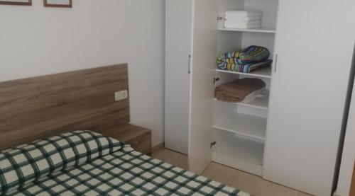 Postel nebo postele na pokoji v ubytování Apartament Sara