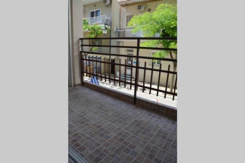 a view of a balcony with a fence at Loutraki Vibes Apartments in Loutraki