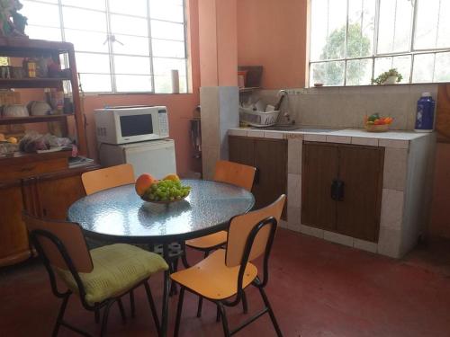 Kuchyň nebo kuchyňský kout v ubytování Cabaña en Fundo Huabayor