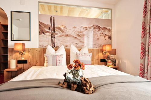 En eller flere senge i et værelse på Apart Almrausch