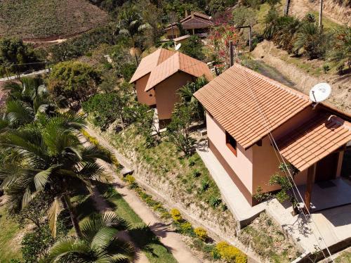 an overhead view of a house with a roof at Pousada Flor Nativa in Brejetuba