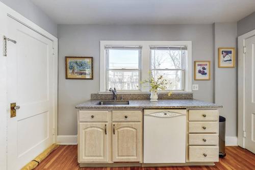 a kitchen with a sink and a counter at Belltown Retreat in Stamford