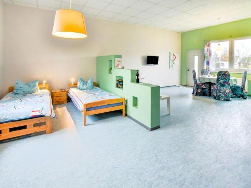 Katil atau katil-katil dalam bilik di Wohnung nahe Ostsee Graal Müritz