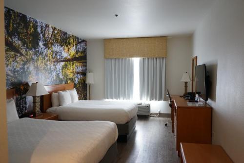 Postel nebo postele na pokoji v ubytování The Hanford Hotel