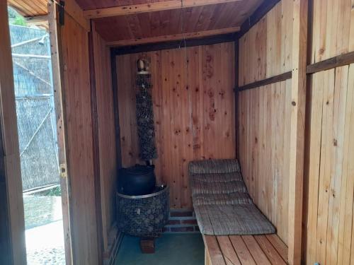 an inside of a sauna with two stairs in it at Villa Namaste, Cabaña Namaste 1 in Curití