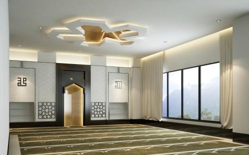 Postel nebo postele na pokoji v ubytování Raia Hotel & Convention Centre Kuching