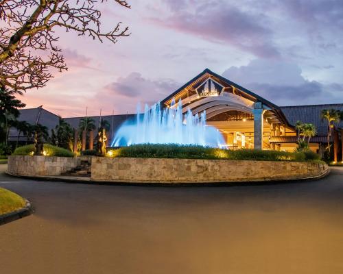 a water fountain in front of a building at Discovery Kartika Plaza Hotel in Kuta