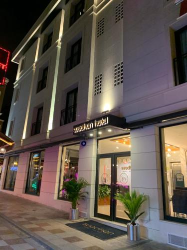 a store front of a building at night at Suadhan Hotel in Istanbul