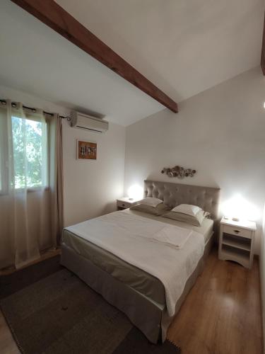 Ένα ή περισσότερα κρεβάτια σε δωμάτιο στο Villa Jeromine