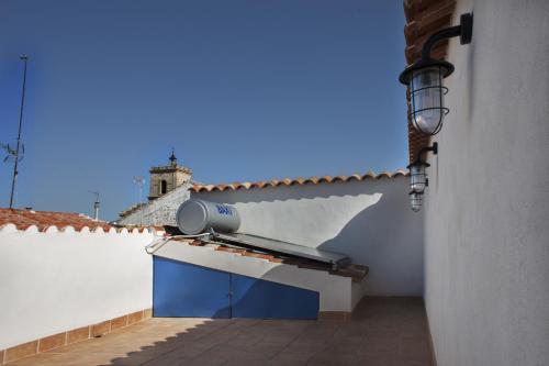 a view from a balcony of a house with a roof at El Loft de Dulcinea: en el corazón de El Toboso. in El Toboso