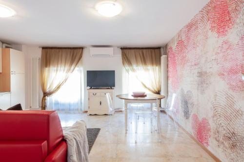 TV a/nebo společenská místnost v ubytování RivApartmentsDowntowN Love